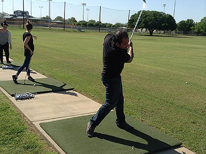 Ahsan hitting the ball off the course during Central Station Marketing's team outing.